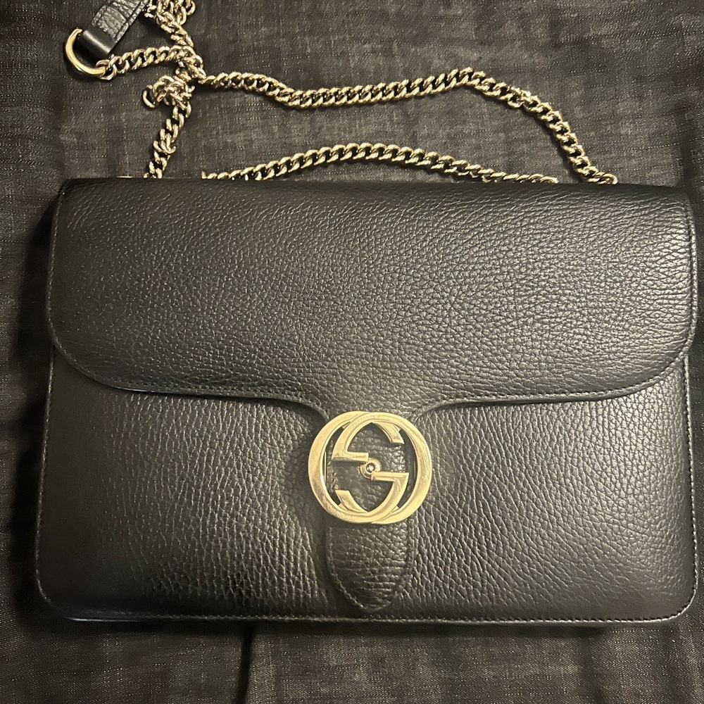Gucci Black and Gold Crossbody Bag with Iconic GG Logo